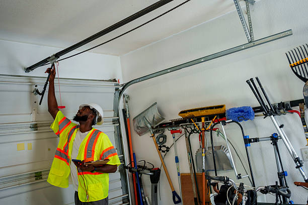Professional Garage Door Panel Replacement technician working in Durand, MI
